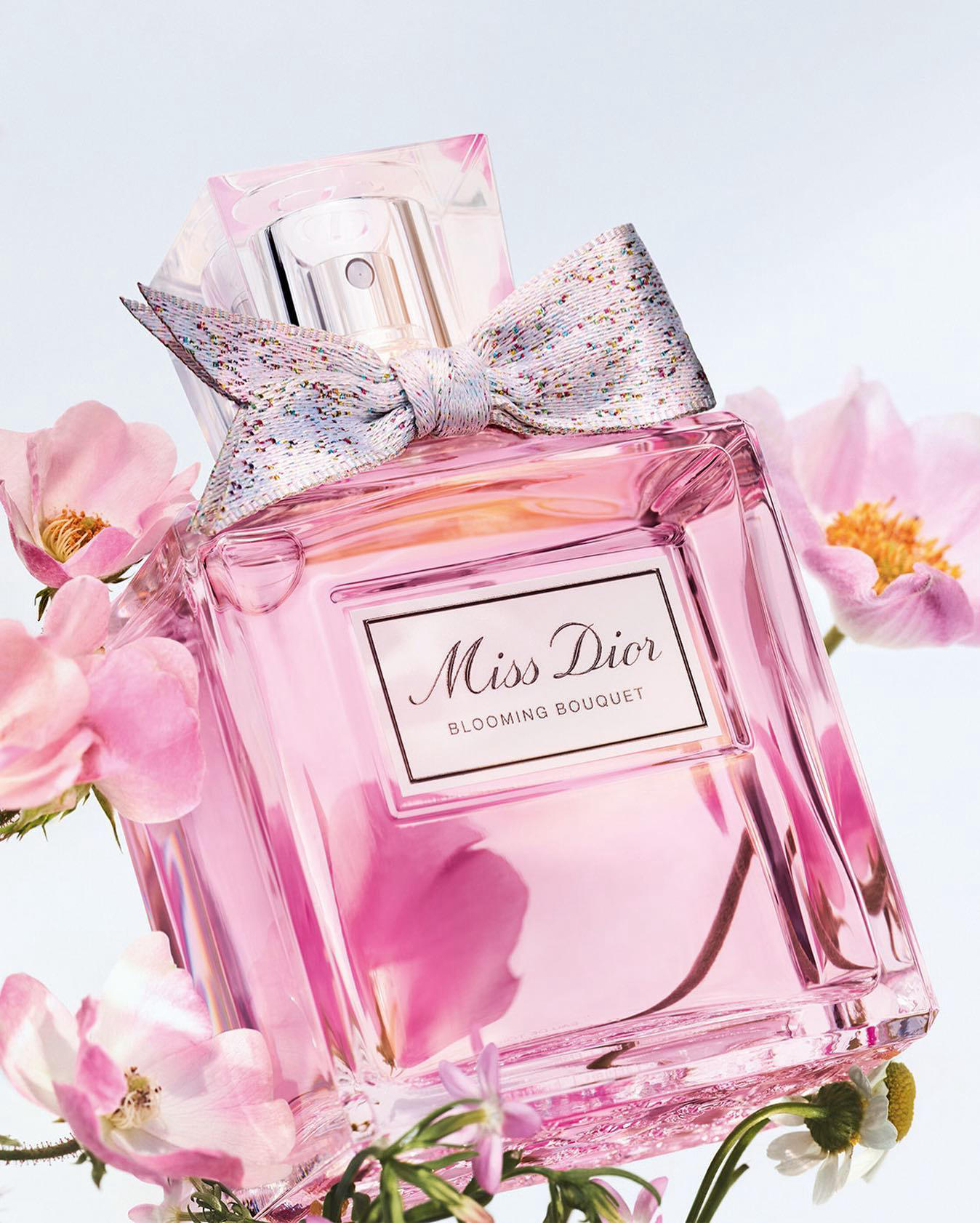 image  1 The Miss Dior Blooming Bouquet fragrance is housed in an exquisite jacquard ribbon woven from 368 th